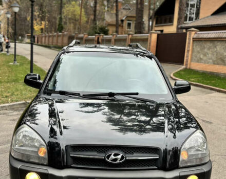 Черный Хендай Туксон, объемом двигателя 1.99 л и пробегом 266 тыс. км за 7500 $, фото 1 на Automoto.ua