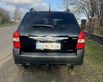 Черный Хендай Туксон, объемом двигателя 1.99 л и пробегом 302 тыс. км за 6900 $, фото 12 на Automoto.ua