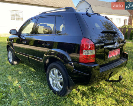 Черный Хендай Туксон, объемом двигателя 1.98 л и пробегом 197 тыс. км за 8000 $, фото 18 на Automoto.ua