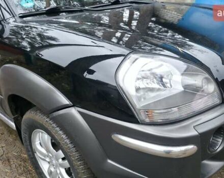 Чорний Хендай Туксон, об'ємом двигуна 2 л та пробігом 207 тис. км за 8200 $, фото 14 на Automoto.ua