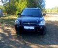 Черный Хендай Туксон, объемом двигателя 2 л и пробегом 236 тыс. км за 8300 $, фото 1 на Automoto.ua