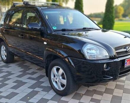 Черный Хендай Туксон, объемом двигателя 2 л и пробегом 190 тыс. км за 8150 $, фото 17 на Automoto.ua