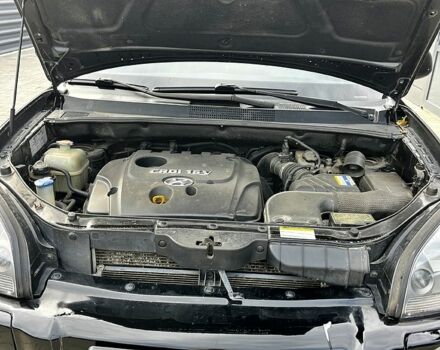 Чорний Хендай Туксон, об'ємом двигуна 2 л та пробігом 240 тис. км за 8600 $, фото 10 на Automoto.ua