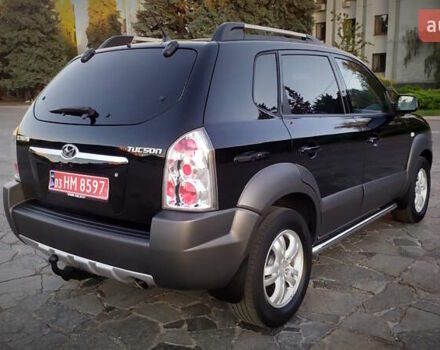 Черный Хендай Туксон, объемом двигателя 2 л и пробегом 230 тыс. км за 8600 $, фото 119 на Automoto.ua