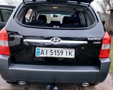 Черный Хендай Туксон, объемом двигателя 2 л и пробегом 272 тыс. км за 7500 $, фото 8 на Automoto.ua