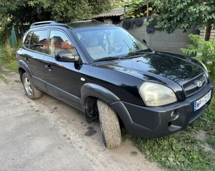 Чорний Хендай Туксон, об'ємом двигуна 2 л та пробігом 330 тис. км за 3700 $, фото 3 на Automoto.ua