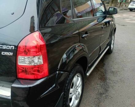 Черный Хендай Туксон, объемом двигателя 2 л и пробегом 200 тыс. км за 8300 $, фото 3 на Automoto.ua