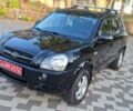 Черный Хендай Туксон, объемом двигателя 2 л и пробегом 190 тыс. км за 8150 $, фото 3 на Automoto.ua