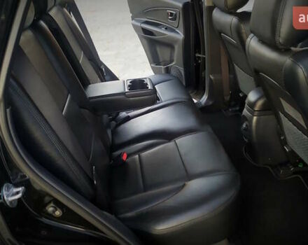 Черный Хендай Туксон, объемом двигателя 2 л и пробегом 230 тыс. км за 8600 $, фото 182 на Automoto.ua