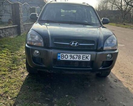 Черный Хендай Туксон, объемом двигателя 1.99 л и пробегом 302 тыс. км за 6900 $, фото 7 на Automoto.ua