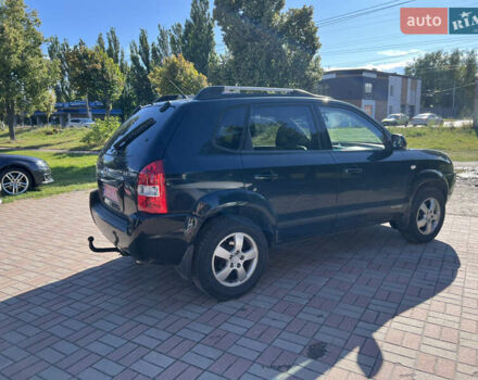 Чорний Хендай Туксон, об'ємом двигуна 2 л та пробігом 229 тис. км за 8400 $, фото 1 на Automoto.ua