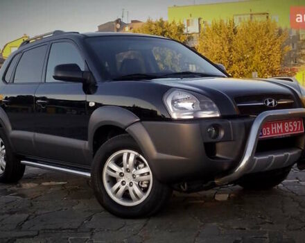 Черный Хендай Туксон, объемом двигателя 2 л и пробегом 230 тыс. км за 8600 $, фото 30 на Automoto.ua