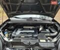 Черный Хендай Туксон, объемом двигателя 2 л и пробегом 198 тыс. км за 7800 $, фото 7 на Automoto.ua