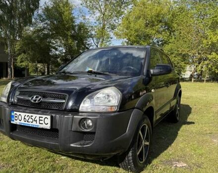 Чорний Хендай Туксон, об'ємом двигуна 2 л та пробігом 186 тис. км за 8099 $, фото 3 на Automoto.ua