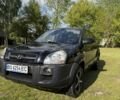 Чорний Хендай Туксон, об'ємом двигуна 2 л та пробігом 186 тис. км за 8099 $, фото 3 на Automoto.ua