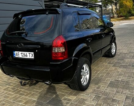 Чорний Хендай Туксон, об'ємом двигуна 2 л та пробігом 240 тис. км за 8600 $, фото 4 на Automoto.ua
