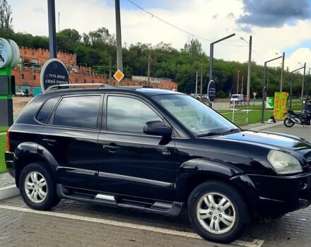 Черный Хендай Туксон, объемом двигателя 2 л и пробегом 175 тыс. км за 8900 $, фото 6 на Automoto.ua