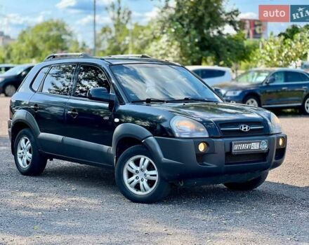 Черный Хендай Туксон, объемом двигателя 2 л и пробегом 227 тыс. км за 8200 $, фото 7 на Automoto.ua