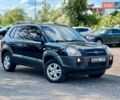 Черный Хендай Туксон, объемом двигателя 2 л и пробегом 227 тыс. км за 8200 $, фото 7 на Automoto.ua
