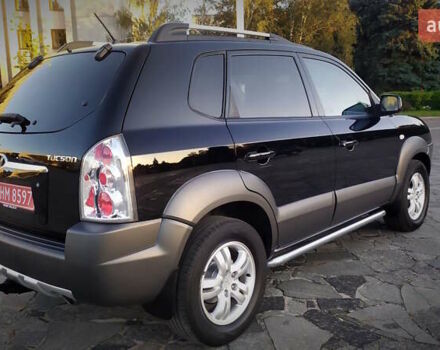 Черный Хендай Туксон, объемом двигателя 2 л и пробегом 230 тыс. км за 8600 $, фото 39 на Automoto.ua