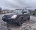 Черный Хендай Туксон, объемом двигателя 2 л и пробегом 280 тыс. км за 3500 $, фото 1 на Automoto.ua