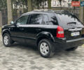 Черный Хендай Туксон, объемом двигателя 2 л и пробегом 180 тыс. км за 7700 $, фото 17 на Automoto.ua