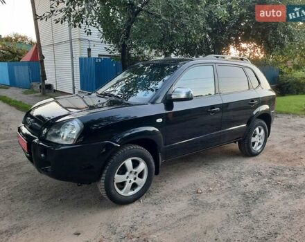 Черный Хендай Туксон, объемом двигателя 2 л и пробегом 219 тыс. км за 7990 $, фото 40 на Automoto.ua