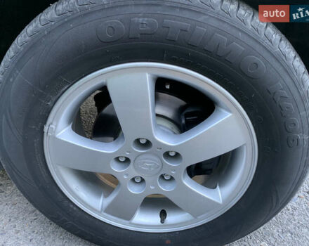 Чорний Хендай Туксон, об'ємом двигуна 2 л та пробігом 56 тис. км за 9500 $, фото 1 на Automoto.ua