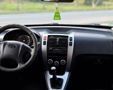 Черный Хендай Туксон, объемом двигателя 2 л и пробегом 190 тыс. км за 8150 $, фото 30 на Automoto.ua