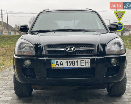 Черный Хендай Туксон, объемом двигателя 2 л и пробегом 180 тыс. км за 7700 $, фото 5 на Automoto.ua