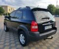 Черный Хендай Туксон, объемом двигателя 2 л и пробегом 240 тыс. км за 7900 $, фото 1 на Automoto.ua