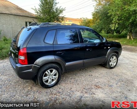 Черный Хендай Туксон, объемом двигателя 2.7 л и пробегом 145 тыс. км за 6950 $, фото 4 на Automoto.ua