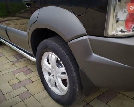 Чорний Хендай Туксон, об'ємом двигуна 2 л та пробігом 229 тис. км за 8600 $, фото 82 на Automoto.ua