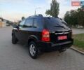 Чорний Хендай Туксон, об'ємом двигуна 1.98 л та пробігом 192 тис. км за 7950 $, фото 4 на Automoto.ua