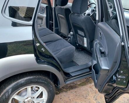 Черный Хендай Туксон, объемом двигателя 2 л и пробегом 272 тыс. км за 7500 $, фото 6 на Automoto.ua