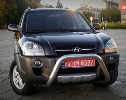 Черный Хендай Туксон, объемом двигателя 2 л и пробегом 230 тыс. км за 8600 $, фото 24 на Automoto.ua