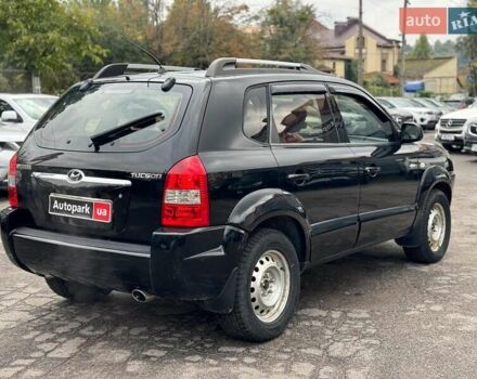 Черный Хендай Туксон, объемом двигателя 2 л и пробегом 177 тыс. км за 8940 $, фото 4 на Automoto.ua