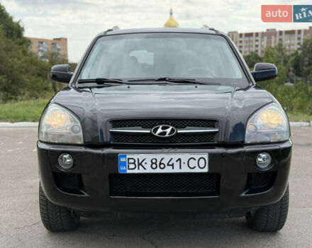 Черный Хендай Туксон, объемом двигателя 2 л и пробегом 300 тыс. км за 7350 $, фото 32 на Automoto.ua