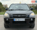 Черный Хендай Туксон, объемом двигателя 2 л и пробегом 300 тыс. км за 7350 $, фото 32 на Automoto.ua