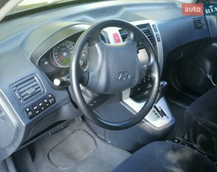 Черный Хендай Туксон, объемом двигателя 2 л и пробегом 270 тыс. км за 10250 $, фото 31 на Automoto.ua