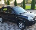 Чорний Хендай Туксон, об'ємом двигуна 2 л та пробігом 190 тис. км за 8300 $, фото 2 на Automoto.ua