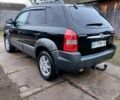 Черный Хендай Туксон, объемом двигателя 2 л и пробегом 272 тыс. км за 7500 $, фото 4 на Automoto.ua