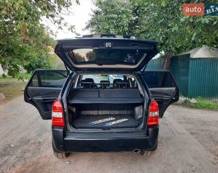 Черный Хендай Туксон, объемом двигателя 2 л и пробегом 219 тыс. км за 7990 $, фото 80 на Automoto.ua