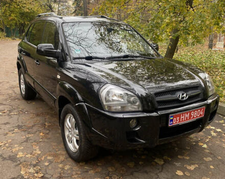 Черный Хендай Туксон, объемом двигателя 2 л и пробегом 178 тыс. км за 7860 $, фото 1 на Automoto.ua