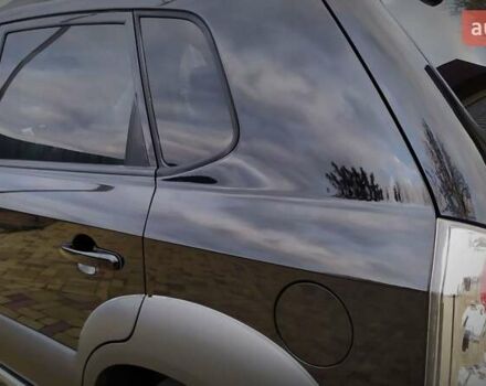 Чорний Хендай Туксон, об'ємом двигуна 2 л та пробігом 229 тис. км за 8600 $, фото 81 на Automoto.ua