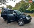 Черный Хендай Туксон, объемом двигателя 2 л и пробегом 219 тыс. км за 7990 $, фото 88 на Automoto.ua