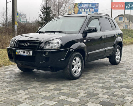 Черный Хендай Туксон, объемом двигателя 2 л и пробегом 180 тыс. км за 7700 $, фото 2 на Automoto.ua