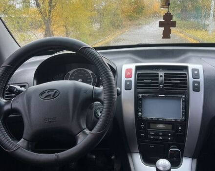 Хендай Туксон 2007 у Кам'янське (Дніпродзержинськ) на Automoto.ua Чорний Хендай Туксон, об'ємом двигуна 2 л та пробігом 162 тис. км за 7999 $, фото 13 на Automoto.ua