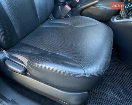 Черный Хендай Туксон, объемом двигателя 1.98 л и пробегом 286 тыс. км за 7300 $, фото 19 на Automoto.ua