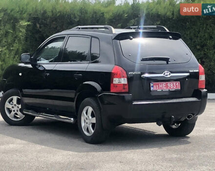 Чорний Хендай Туксон, об'ємом двигуна 2 л та пробігом 141 тис. км за 8200 $, фото 5 на Automoto.ua